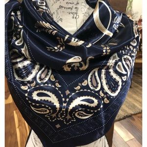 35 in square, satin scarf in a rich looking navy with design in beige & tan.